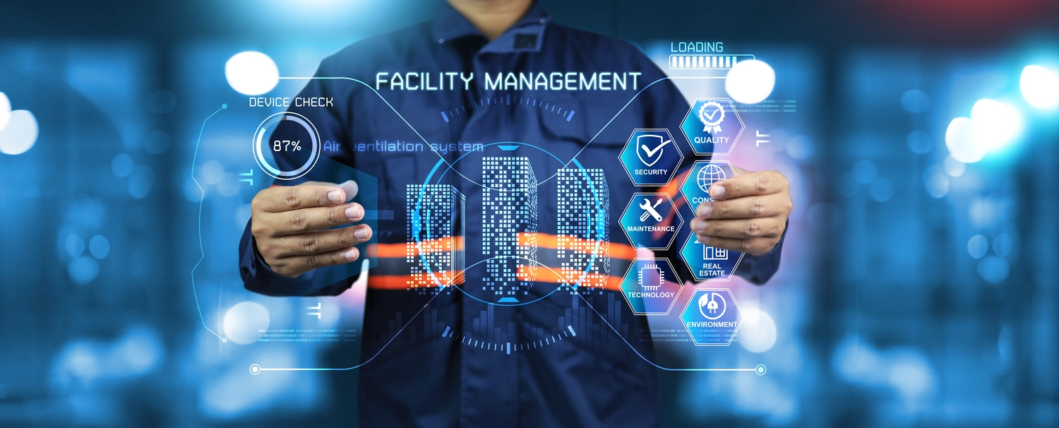 R.S Sicco UG – Wasser- & Brandschadensanierung, Reinigung und Gebäudedienste - Ein Ingenieur bedient ein virtuelles Dashboard zur Überwachung der Facility-Management-Arbeiten in einem Immobilieninstandhaltungssystem.